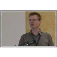 Querying OWL 2 QL and non-monotonic rules icon